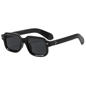 Square black frame sunglasses with silver rivets and dark grey lenses for street style