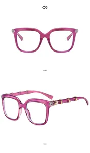 Close-up of translucent purple square frame with unique gold-accented bamboo temples