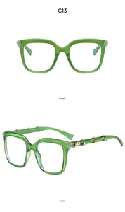 Detail of green bamboo-shaped temples with gold metal accents on retro sunglasses