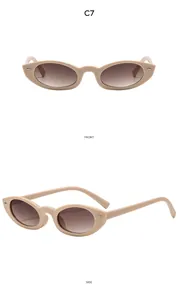 Detailansicht der beige Cat-Eye-Sonnenbrille mit Verlaufsgläsern und Metalldekor