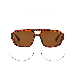 Detail of vintage aviator sunglasses with leopard print frame and double metal bridge