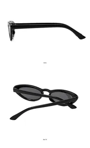 Side and back view of vintage oval black sunglasses with cat eye frame and dark grey lenses