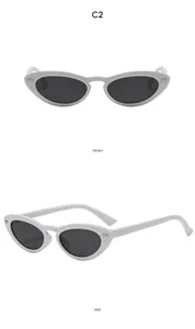 Front and side views of white vintage oval sunglasses with silver rivet accents