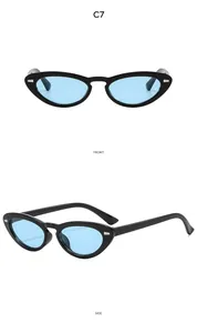 Front and side views of vintage oval cat-eye sunglasses with black frames and blue lenses