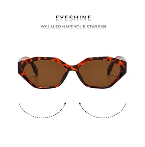 Détail macro de lunettes de soleil polygonales rétro avec monture écaillée et verres bruns