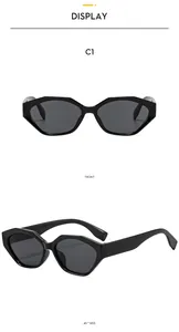 Vues de face et de profil à 45 degrés des lunettes de soleil œil de chat polygonales noires