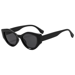 Retro Y2K cat-eye sunglasses with thick black geometric frames and dark polarized lenses