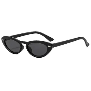 Classic oval cat eye sunglasses in black with silver accents and dark grey lenses