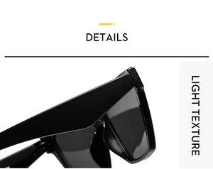 Detail shot of black oversized square sunglasses showing lightweight frame texture