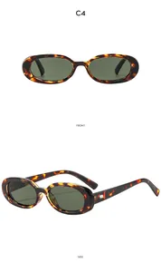 Detail view of oval tortoiseshell sunglasses showing front and side profile with silver studs