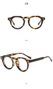 Vue détaillée des lunettes de soleil rondes écaille avec rivets argentés et profil latéral