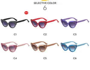 Close-up of kids cat eye sunglasses in six glitter colors with gradient lenses