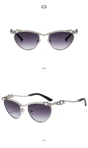 Detaillierte Front- und Seitenansicht der Y2K Katzenaugen-Sonnenbrille mit Strass und lila Glas