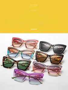 Detail of trendy cat-eye frames featuring unique heart-shaped metal hinges in multiple colors