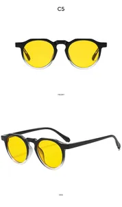 Front and side views of vintage oval sunglasses with black gradient frames and yellow lenses