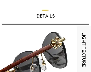 Detailed close-up of golden hollow floral hinge and wood grain temples on sunglasses