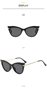 Front- und Seitenansicht der Cat-Eye-Sonnenbrille mit schwarzem Rahmen und goldenen Bügeln