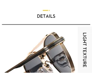 Gros plan de lunettes aviateur montrant la texture du métal doré et le détail noir