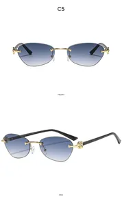 Detailed front and side view of rimless cat-eye sunglasses with blue gradient lenses