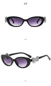 Détail de lunettes œil de chat avec nœud en strass argenté, vues de face et de profil