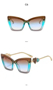 Front and side view of cat-eye sunglasses with gradient lenses and heart temple detail