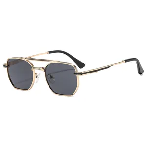 Lunettes aviateur rétro à double pont avec monture dorée et verres hexagonaux foncés