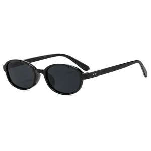 Retro black oval sunglasses with silver rivet accents and dark grey lenses for women