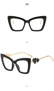 Front and side view of black cat-eye glasses frame with gold heart metal temples