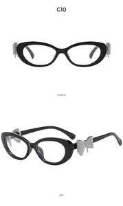 Détail de lunettes de soleil œil de chat Y2K avec nœud en strass argentés