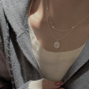 S925 sterling silver queen coin pendant double layer necklace shown on neck