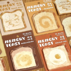 Creative toast-shaped sticky notes in four realistic styles on a warm wooden background