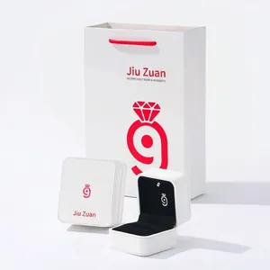 Elegant white jewelry gift set including square box and matching paper carry bag