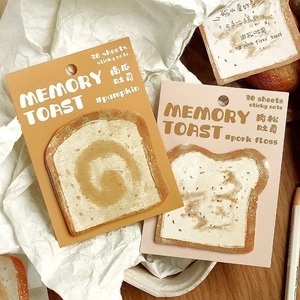 Creative toast-shaped sticky notes with Memory Toast design on white crinkled paper