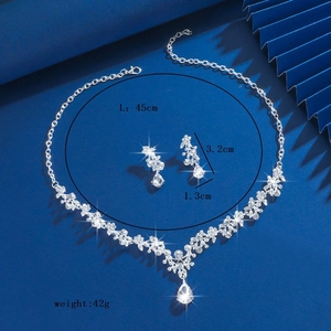 Detail view of bridal rhinestone jewelry set with necklace dimensions and earrings size