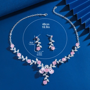 Detailed size view of pink flower bridal jewelry set with necklace and drop earrings