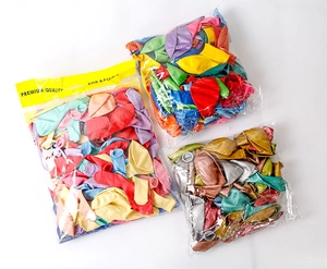 Flat lay of assorted macaron and metallic latex balloons in clear retail packaging