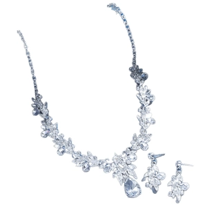 Sparkling crystal bridal jewelry set with floral vine necklace and teardrop earrings