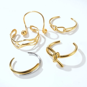 Minimalist open gold bracelets set featuring hollow wave texture and knot designs