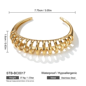 Technical dimensions and macro details of a gold hollow striped stainless steel cuff bracelet