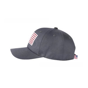 Close-up of vintage American flag embroidery on dark grey washed cotton baseball cap