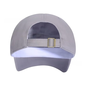 Detail view of the back of a vintage grey baseball cap with adjustable metal buckle