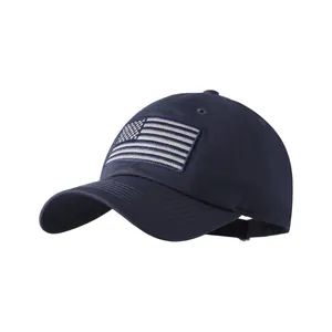 Close-up of vintage navy baseball cap featuring American flag embroidery and washed fabric