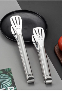 Detail of hollowed 304 stainless steel food tongs for BBQ and steak grilling set