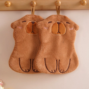 Detail of hanging Capybara brown coral fleece hand towels with soft plush texture