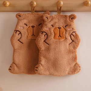 Detail of cute Capybara hanging hand towel made of soft thickened coral fleece material