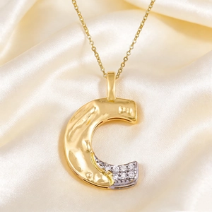 Gold letter C pendant necklace with hammered texture and micro-paved white zircons