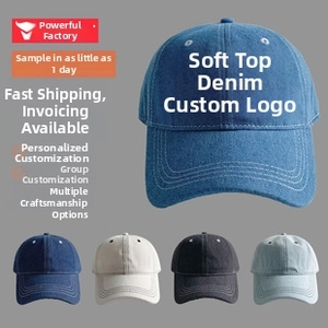 Detail view of cotton denim baseball cap showing reinforced stitching and breathable eyelets