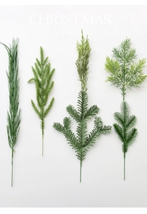 Detailed view of four assorted artificial green pine needles for DIY Christmas decor