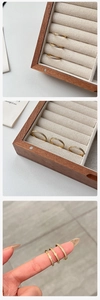 Close-up of minimalist 18k gold plated ring set with micro-pave cubic zirconia crystals