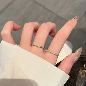 Minimalist 18k gold plated titanium steel rings with micro-set cubic zirconia on hand